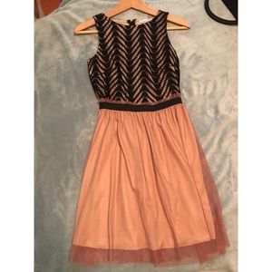 Black and blush colored dress